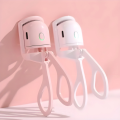 Compact and Rechargeable Mini Electric Eyelash Curler for Quick Long-Lasting Curling Ideal Tool for Women. 