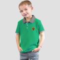 Kids Max 21 Polo Shirt Embroidered Logo with Striking Contrast Collar. 