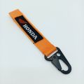Honda Ribbon Key Chains - Orange. 