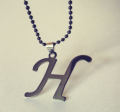 Stylish Silver And Black Alphabet H Locket. 