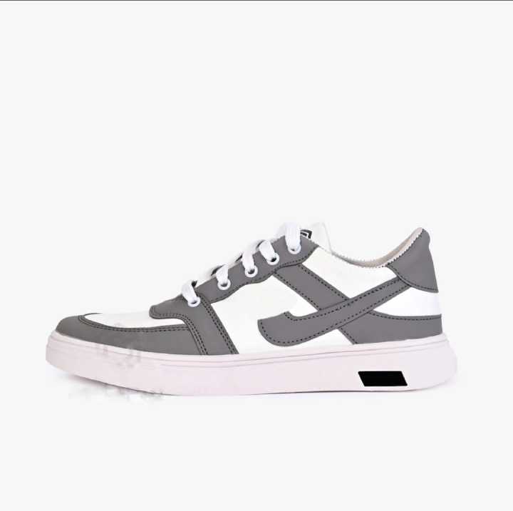black%20and%20white%20casual%20sneaker%20%E2%80%94%20perfect%20for%20both%20streetwear%20and%20everyday%20use.%20-%20Image%204