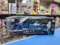F1 Remote Control Formula Car 1:18 Scale High-Speed Spray Stunt RC Racing Car For Kids F1 Formula Smoke Spray RC Rechargeable Moving Racing Lasting 2.4G High Speed ​​Drift Sports Car For Boys Comes in Two Color Variation Best AMAZING RC Car For Gifting. 