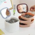 Rotatable 4 layers jewellery organizer random color organizing jewellery good quality. 