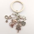 1pair veterinary key ring charm stethoscope animal protective gear animal dog cat nurse key chain veterinary jewelry gift. 