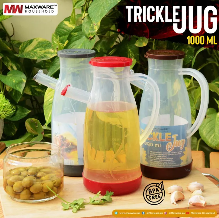 Random%20Color%20Kitchen%20Plastic%20Oil%20Jug%20With%20Lid%20&%20Handle%20-%201%20Liter,%20Plastic%20Oil%20Bottle%20for%20Cooking%20Use%20Oil%20Containers%20-%20Image%205