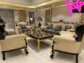 "Luxurious Chinioti Wood Handcrafted Sofa Sets - 7 & 5 Seater". 