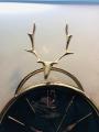 NEW 3D GLASS WALL CLOCK WITH SCREW HORN GOAT STRUCTURE ON TOP AND ROUND GLASS BOTTOM WITH PENDULUM FANCY AND ATTRACTIVE CLOCK IN BLACK GOLD COLOUR STYLISH DESIGN SMOOTH MACHINE WALL CLOCK HANGING WALL CLOCK HOME DECORATION PERFECT FOR YOUR LIVING ROOM. 