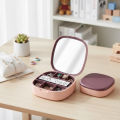 imported Portable jewelry organizer box with a built-in mirror. 