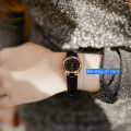 CASIO BLACK DIAL WITH BLACK LEATHER STRAP WOMEN'S WATCH - LTP-1094Q-1ARDF. 
