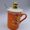 orange coffee mug teddy bear on lid with metal spoon best coffee or milk mug for kids and adults  best for gifting. 