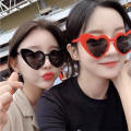 Plastic Heart-shaped sunglasses Lightweight Heart design Women's sunglasses Love heart sunglasses for Summer beach glasses Outdoor activities Fashion enthusiasts Casual wear Party or event accessory. 
