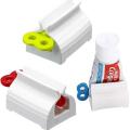 Rolling Tube Toothpaste Squeezer Dispenser Toothpaste Seat Holder Stand. 