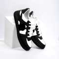 black and white casual sneaker — perfect for both streetwear and everyday use.. 