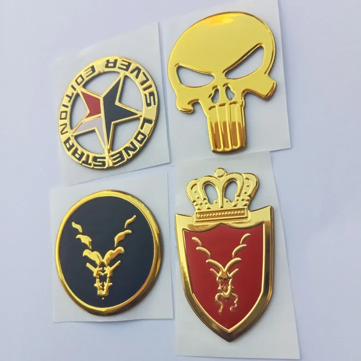 4pcs%20silicon%20coated%20stylish%20logos%20for%20all%20cars%20and%20bikes%20easy%20to%20paste%20high%20quality,bumper%20stickers%20and%20decals%20-%20Image%203