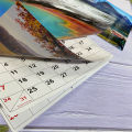 A3 size 2024 European and American English landscape photos wall calendar with different scenery photos every month. 