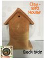 Small clay bird house for small birds. 