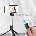 Phone Selfie Stick Tripod Extendable Monopod with Fill Light 360° rotating live streaming phone holder portable tripod. 
