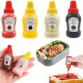 4/12Pcs Mini Portable Sauce Bottles Ketchup Bottle for Lunch Boxes - Travel-Friendly Plastic Condiment Dispensers with Ketchup, Mayonnaise, Mustard, and Jam Labels - Ideal for Picnics and On-the-Go Meals. 