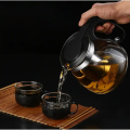 Infuser Kettle and 4 Cups, Black tea with infuser kettle, Teapot set glass infuser teapot and 4 Cups, 950 ml Kettle and 100 ml capacity of each cup. 