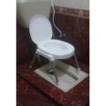 Plastic Material Over The Flush Usage Commode Seat With Four Strong Steel Legs. 