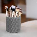 Upgrade your vanity with our Makeup Brush Holder – a sophisticated 360° Rotating Organizer. The clear cover and 5 compartments add glamour to your cosmetics storage, keeping essentials organized with ease. Elevate your beauty routine!. 