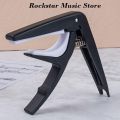 Hard Plastic Capo Black colour (only capo). 