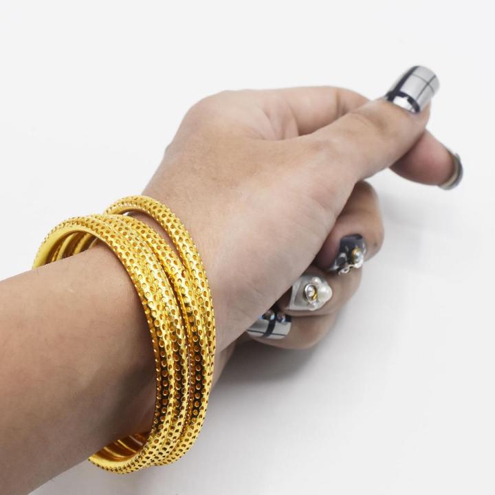 golden pellated 4 pcs jali zigzag bangles