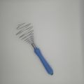 egg mixer- stainless steel egg mixer with plastic handle. 