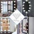 Vanity Lights for Mirror seems Hollywood lights Backlit as Portable LED Bulb Studio Glow for Professional Makeup Stick on Mirror having Dimmable Brightness with 10 Bulbs and 3 Modes White off-white & Warm 12 different color with remote control system. 