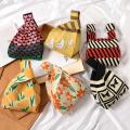 High-end Striped Knitting Bag Niche Design Handbag Retro Wrist Bag Walking and Shopping Lazy Vest Shoulder Bag. 