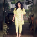 Women Stylish Pearl Beads Kurti Pajama Suit. 
